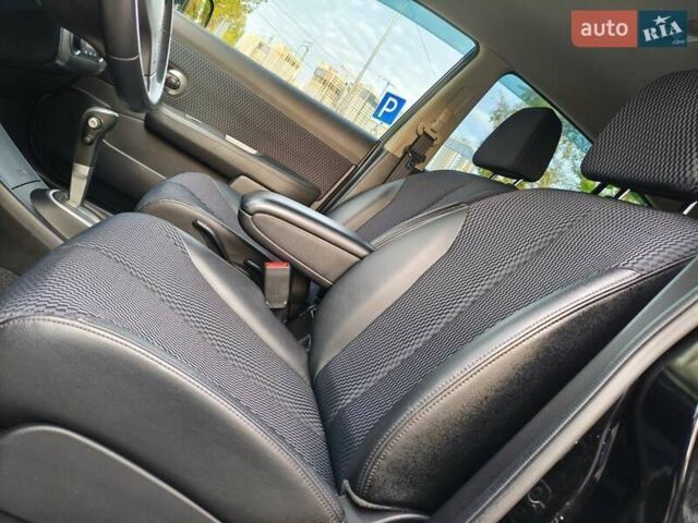 Чорний Ніссан Тііда, об'ємом двигуна 1.5 л та пробігом 84 тис. км за 8800 $, фото 22 на Automoto.ua