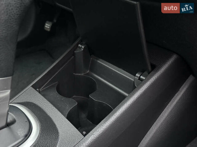 Черный Ниссан Тиида, объемом двигателя 1.5 л и пробегом 95 тыс. км за 8350 $, фото 20 на Automoto.ua