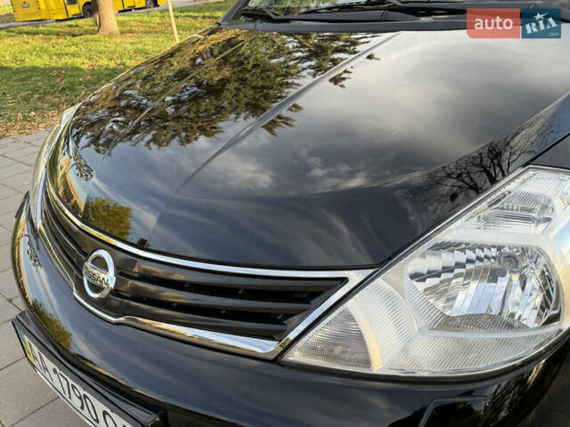 Черный Ниссан Тиида, объемом двигателя 1.6 л и пробегом 60 тыс. км за 9999 $, фото 18 на Automoto.ua