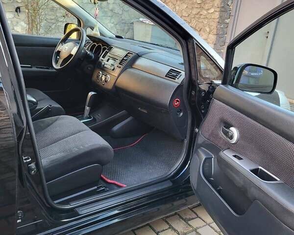 Черный Ниссан Тиида, объемом двигателя 1.6 л и пробегом 99 тыс. км за 7500 $, фото 4 на Automoto.ua