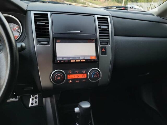 Чорний Ніссан Тііда, об'ємом двигуна 1.5 л та пробігом 95 тис. км за 7999 $, фото 16 на Automoto.ua