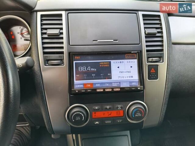 Чорний Ніссан Тііда, об'ємом двигуна 1.5 л та пробігом 84 тис. км за 8800 $, фото 24 на Automoto.ua