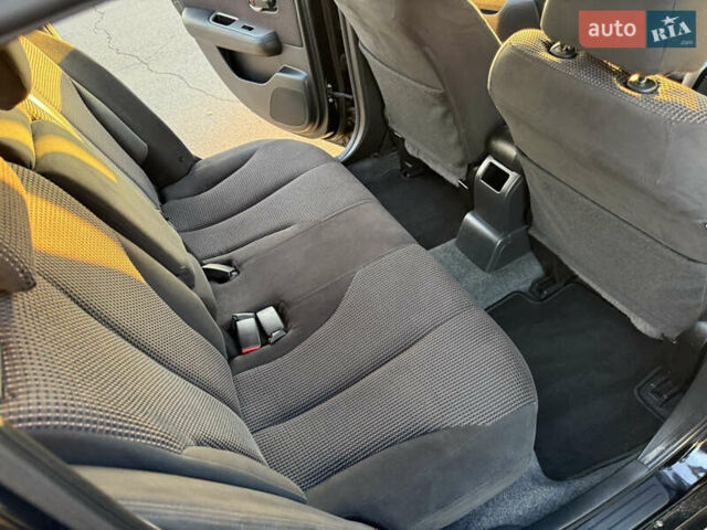 Черный Ниссан Тиида, объемом двигателя 1.6 л и пробегом 60 тыс. км за 9999 $, фото 95 на Automoto.ua