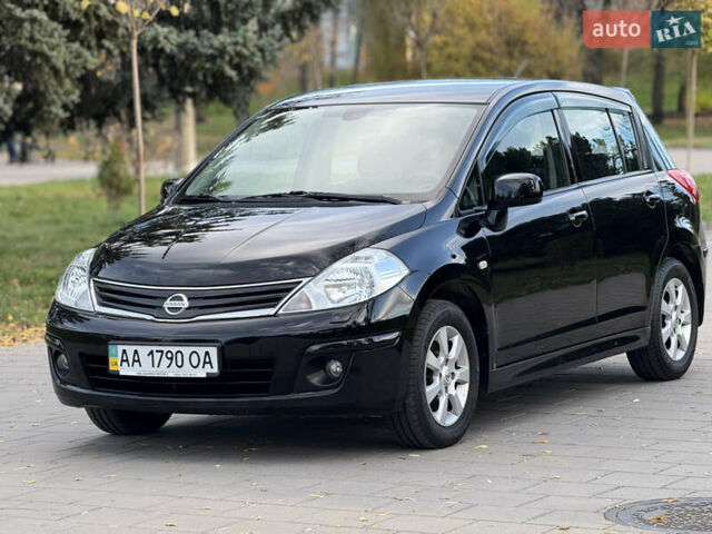 Черный Ниссан Тиида, объемом двигателя 1.6 л и пробегом 60 тыс. км за 9999 $, фото 1 на Automoto.ua
