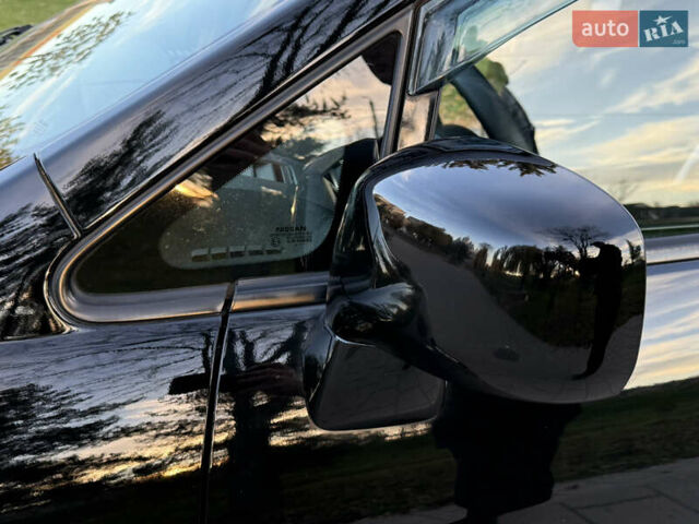 Черный Ниссан Тиида, объемом двигателя 1.6 л и пробегом 60 тыс. км за 9999 $, фото 85 на Automoto.ua