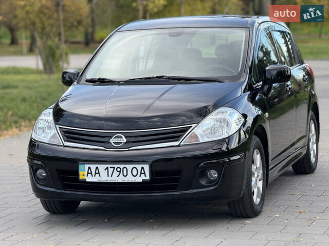 Черный Ниссан Тиида, объемом двигателя 1.6 л и пробегом 60 тыс. км за 9999 $, фото 2 на Automoto.ua