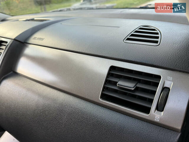 Черный Ниссан Тиида, объемом двигателя 1.6 л и пробегом 60 тыс. км за 9999 $, фото 48 на Automoto.ua