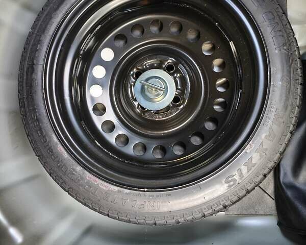 Чорний Ніссан Тііда, об'ємом двигуна 1.5 л та пробігом 84 тис. км за 8800 $, фото 17 на Automoto.ua