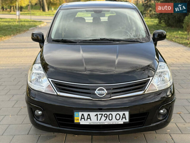 Черный Ниссан Тиида, объемом двигателя 1.6 л и пробегом 60 тыс. км за 9999 $, фото 19 на Automoto.ua