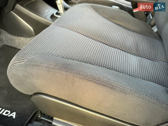 Черный Ниссан Тиида, объемом двигателя 1.6 л и пробегом 60 тыс. км за 9999 $, фото 54 на Automoto.ua