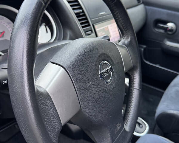 Черный Ниссан Тиида, объемом двигателя 1.5 л и пробегом 95 тыс. км за 8350 $, фото 11 на Automoto.ua