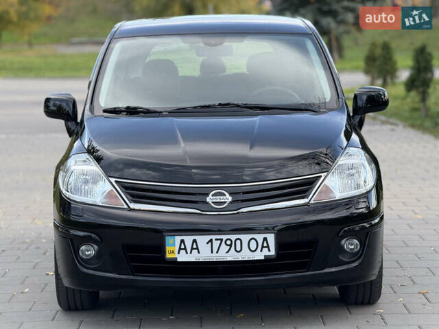 Черный Ниссан Тиида, объемом двигателя 1.6 л и пробегом 60 тыс. км за 9999 $, фото 3 на Automoto.ua