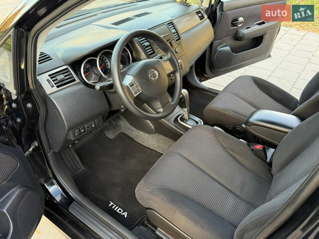 Черный Ниссан Тиида, объемом двигателя 1.6 л и пробегом 60 тыс. км за 9999 $, фото 50 на Automoto.ua