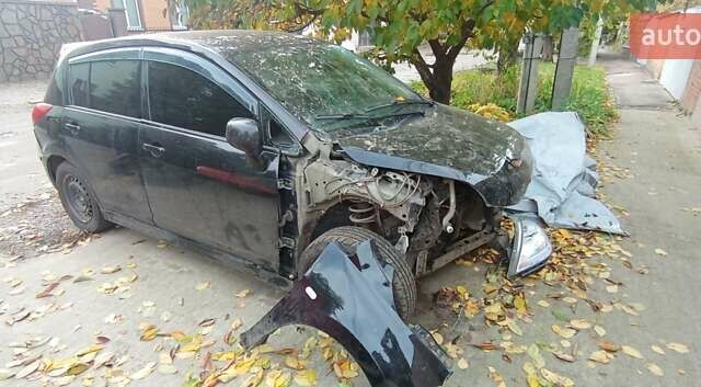 Чорний Ніссан Тііда, об'ємом двигуна 1.6 л та пробігом 280 тис. км за 2000 $, фото 7 на Automoto.ua