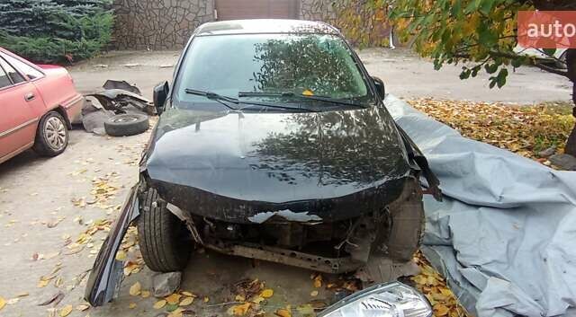 Чорний Ніссан Тііда, об'ємом двигуна 1.6 л та пробігом 280 тис. км за 2000 $, фото 4 на Automoto.ua