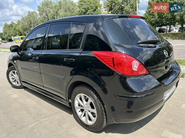 Черный Ниссан Тиида, объемом двигателя 1.6 л и пробегом 188 тыс. км за 6500 $, фото 18 на Automoto.ua