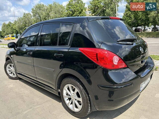 Черный Ниссан Тиида, объемом двигателя 1.6 л и пробегом 188 тыс. км за 6500 $, фото 20 на Automoto.ua