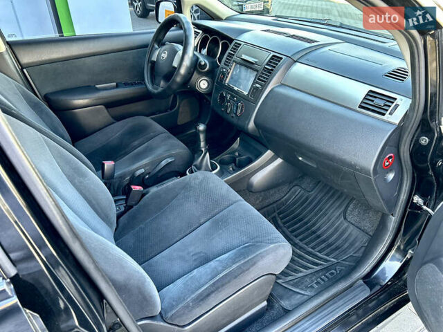 Черный Ниссан Тиида, объемом двигателя 1.6 л и пробегом 188 тыс. км за 6500 $, фото 29 на Automoto.ua