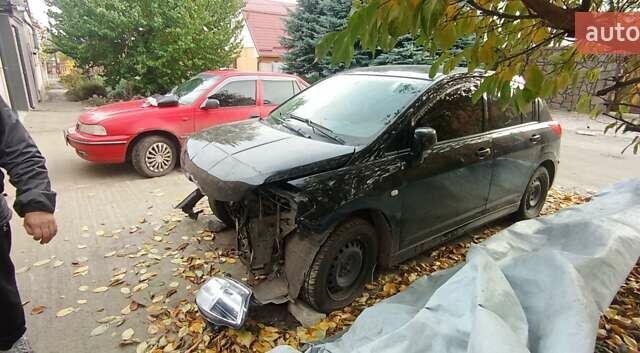 Чорний Ніссан Тііда, об'ємом двигуна 1.6 л та пробігом 280 тис. км за 2000 $, фото 2 на Automoto.ua