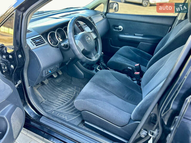 Черный Ниссан Тиида, объемом двигателя 1.6 л и пробегом 188 тыс. км за 6500 $, фото 22 на Automoto.ua