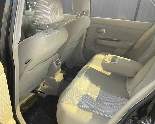 Черный Ниссан Тиида, объемом двигателя 1.6 л и пробегом 200 тыс. км за 4250 $, фото 6 на Automoto.ua