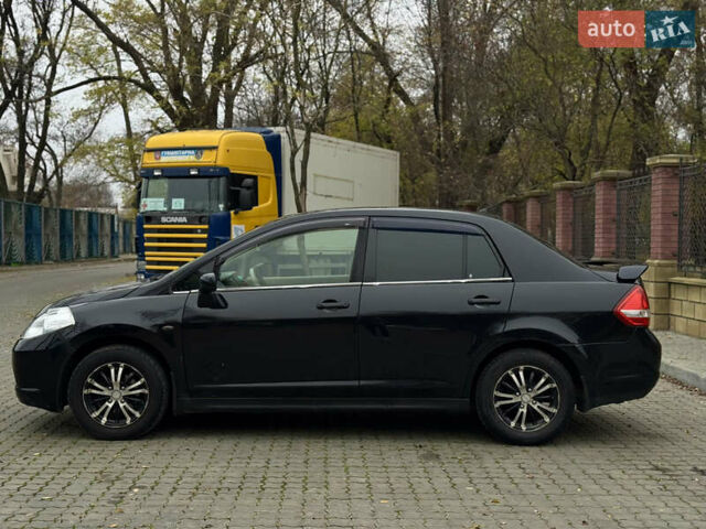 Черный Ниссан Тиида, объемом двигателя 1.6 л и пробегом 132 тыс. км за 4850 $, фото 1 на Automoto.ua