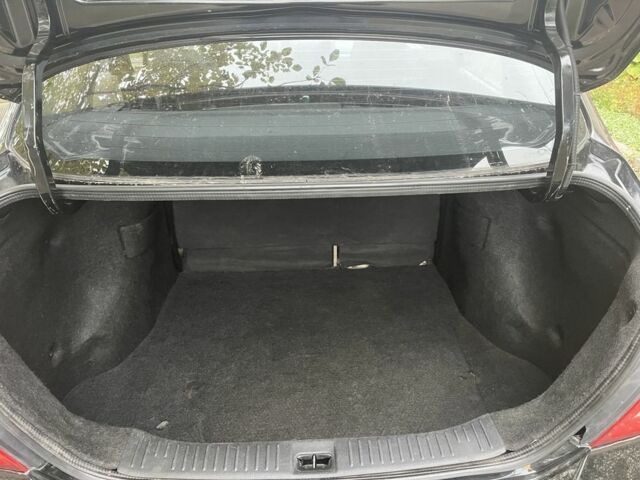 Черный Ниссан Тиида, объемом двигателя 1.6 л и пробегом 304 тыс. км за 4700 $, фото 14 на Automoto.ua