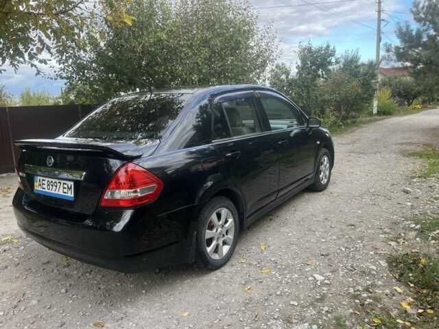 Черный Ниссан Тиида, объемом двигателя 1.6 л и пробегом 304 тыс. км за 4700 $, фото 3 на Automoto.ua