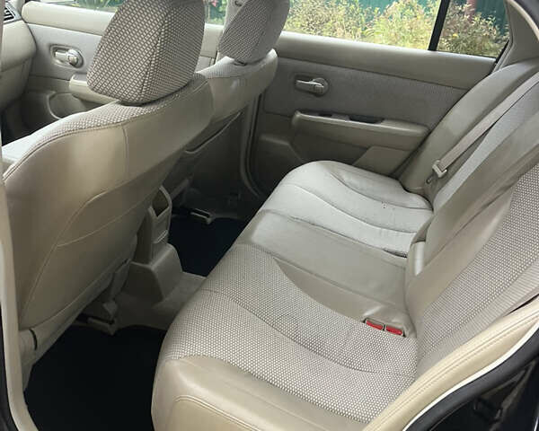 Черный Ниссан Тиида, объемом двигателя 1.6 л и пробегом 304 тыс. км за 4600 $, фото 10 на Automoto.ua