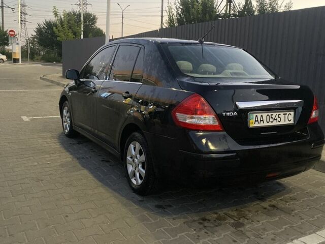 Черный Ниссан Тиида, объемом двигателя 1.6 л и пробегом 200 тыс. км за 4100 $, фото 3 на Automoto.ua