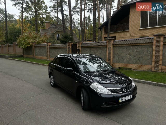 Черный Ниссан Тиида, объемом двигателя 1.6 л и пробегом 188 тыс. км за 5850 $, фото 12 на Automoto.ua