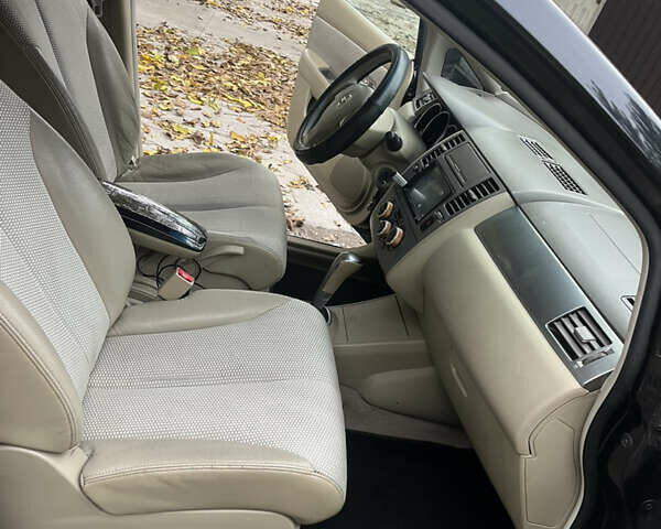 Черный Ниссан Тиида, объемом двигателя 1.6 л и пробегом 304 тыс. км за 4600 $, фото 9 на Automoto.ua