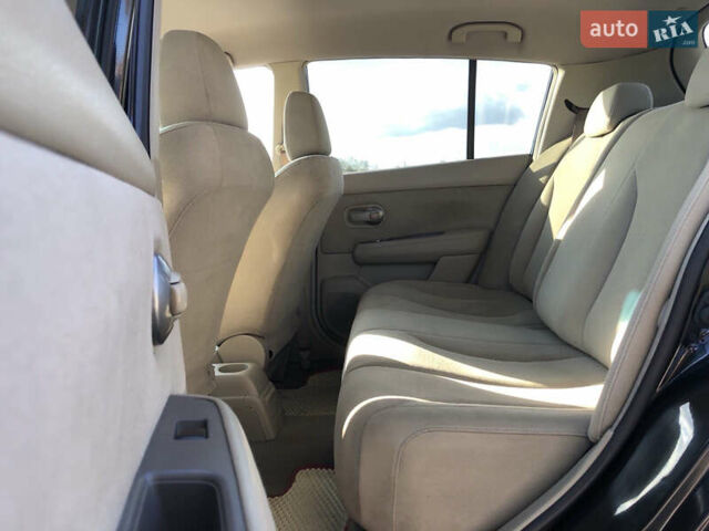 Черный Ниссан Тиида, объемом двигателя 1.6 л и пробегом 257 тыс. км за 5600 $, фото 15 на Automoto.ua