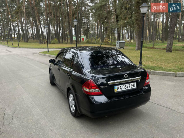 Черный Ниссан Тиида, объемом двигателя 1.6 л и пробегом 188 тыс. км за 5850 $, фото 7 на Automoto.ua