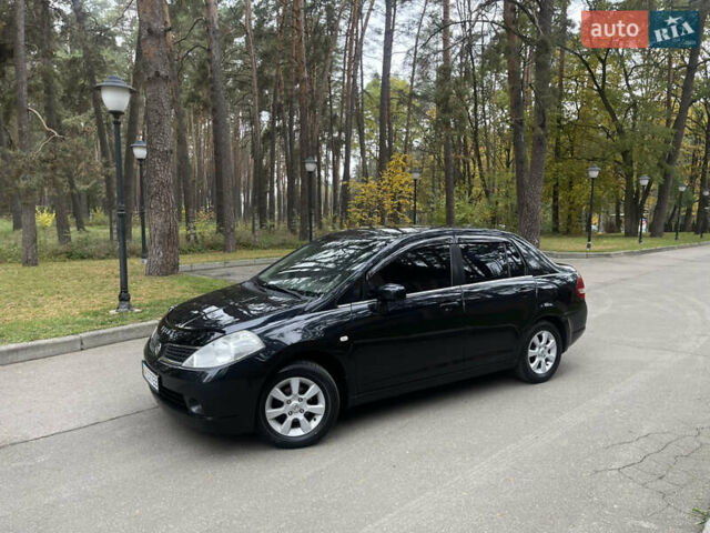 Черный Ниссан Тиида, объемом двигателя 1.6 л и пробегом 188 тыс. км за 5850 $, фото 4 на Automoto.ua