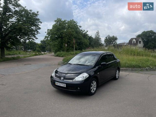 Черный Ниссан Тиида, объемом двигателя 1.6 л и пробегом 187 тыс. км за 5800 $, фото 1 на Automoto.ua
