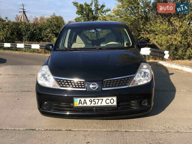 Черный Ниссан Тиида, объемом двигателя 1.6 л и пробегом 257 тыс. км за 5600 $, фото 11 на Automoto.ua