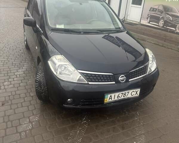 Черный Ниссан Тиида, объемом двигателя 1.6 л и пробегом 150 тыс. км за 5600 $, фото 5 на Automoto.ua