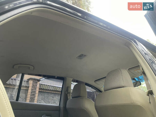 Черный Ниссан Тиида, объемом двигателя 1.6 л и пробегом 188 тыс. км за 5850 $, фото 24 на Automoto.ua