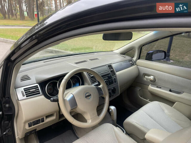 Черный Ниссан Тиида, объемом двигателя 1.6 л и пробегом 188 тыс. км за 5850 $, фото 16 на Automoto.ua