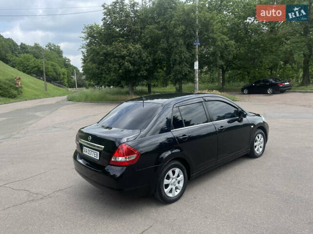 Черный Ниссан Тиида, объемом двигателя 1.6 л и пробегом 187 тыс. км за 5800 $, фото 7 на Automoto.ua
