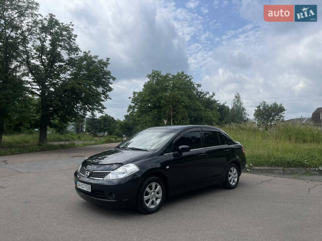 Черный Ниссан Тиида, объемом двигателя 1.6 л и пробегом 187 тыс. км за 5800 $, фото 2 на Automoto.ua