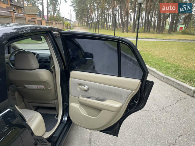 Черный Ниссан Тиида, объемом двигателя 1.6 л и пробегом 188 тыс. км за 5850 $, фото 22 на Automoto.ua