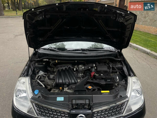 Черный Ниссан Тиида, объемом двигателя 1.6 л и пробегом 188 тыс. км за 5850 $, фото 28 на Automoto.ua