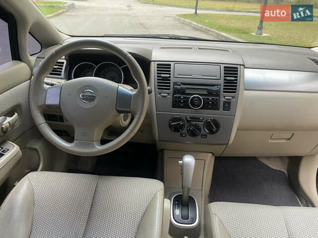 Черный Ниссан Тиида, объемом двигателя 1.6 л и пробегом 188 тыс. км за 5850 $, фото 27 на Automoto.ua