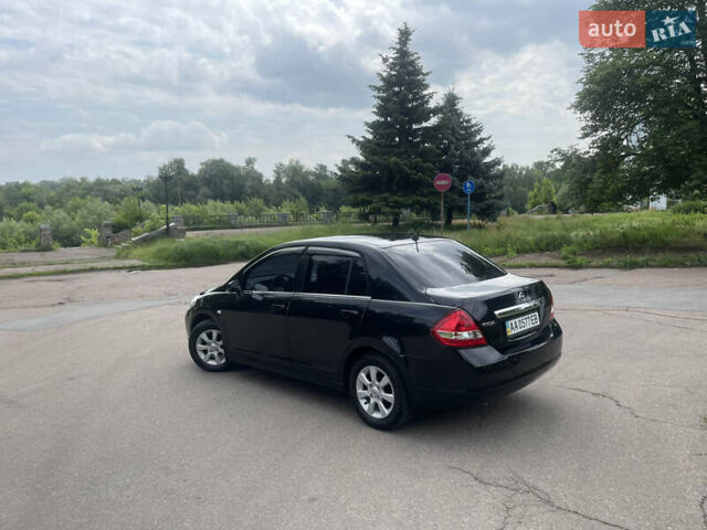 Черный Ниссан Тиида, объемом двигателя 1.6 л и пробегом 187 тыс. км за 5800 $, фото 12 на Automoto.ua