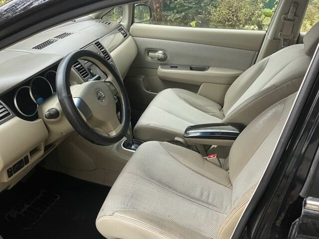 Черный Ниссан Тиида, объемом двигателя 1.6 л и пробегом 304 тыс. км за 4700 $, фото 8 на Automoto.ua