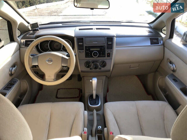 Черный Ниссан Тиида, объемом двигателя 1.6 л и пробегом 257 тыс. км за 5600 $, фото 19 на Automoto.ua