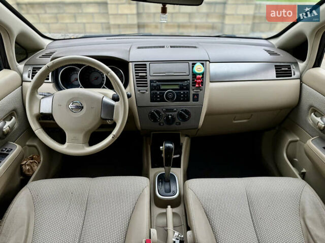 Черный Ниссан Тиида, объемом двигателя 1.6 л и пробегом 132 тыс. км за 4850 $, фото 8 на Automoto.ua