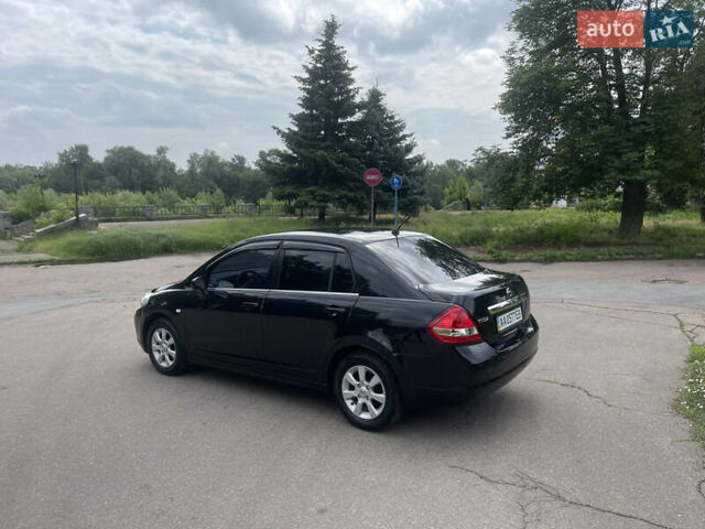 Черный Ниссан Тиида, объемом двигателя 1.6 л и пробегом 187 тыс. км за 5800 $, фото 4 на Automoto.ua
